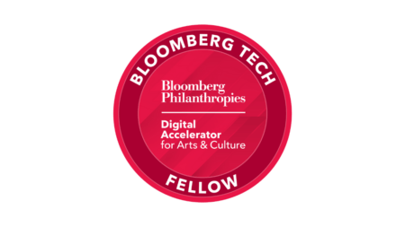 Red circular logo with the words "Bloomberg Tech Fellow" around the edges and "Bloomberg Philanthropies Digital Accelerator for Arts & Culture" in the center.